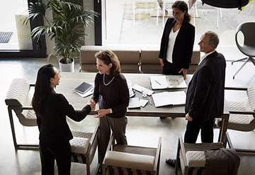 Woman examines economic data in futuristic office